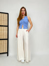 Top smanicato con bottoni gioiello